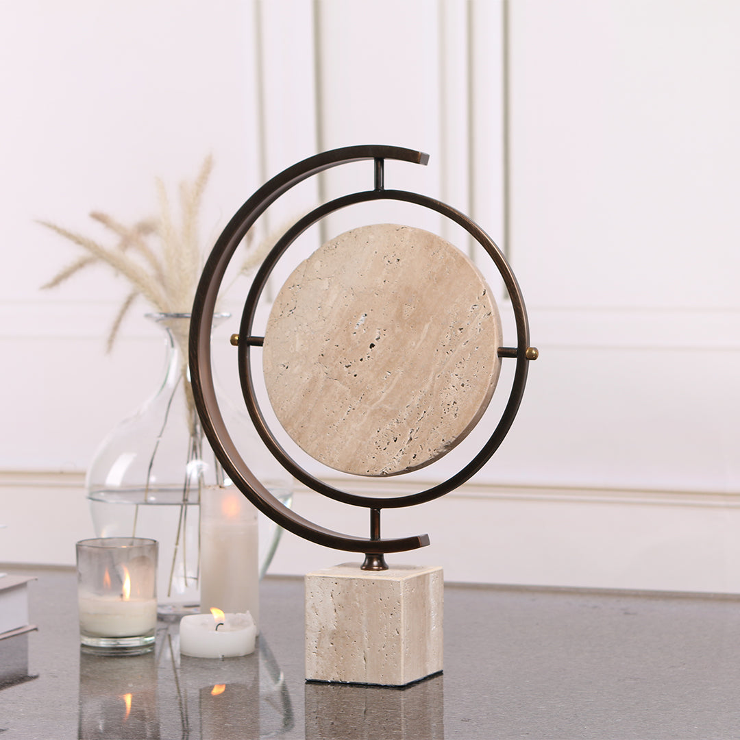 Marble globe sculpture by BEACON, a stylish home decor figurine with intricate marble detailing and a spherical design.
