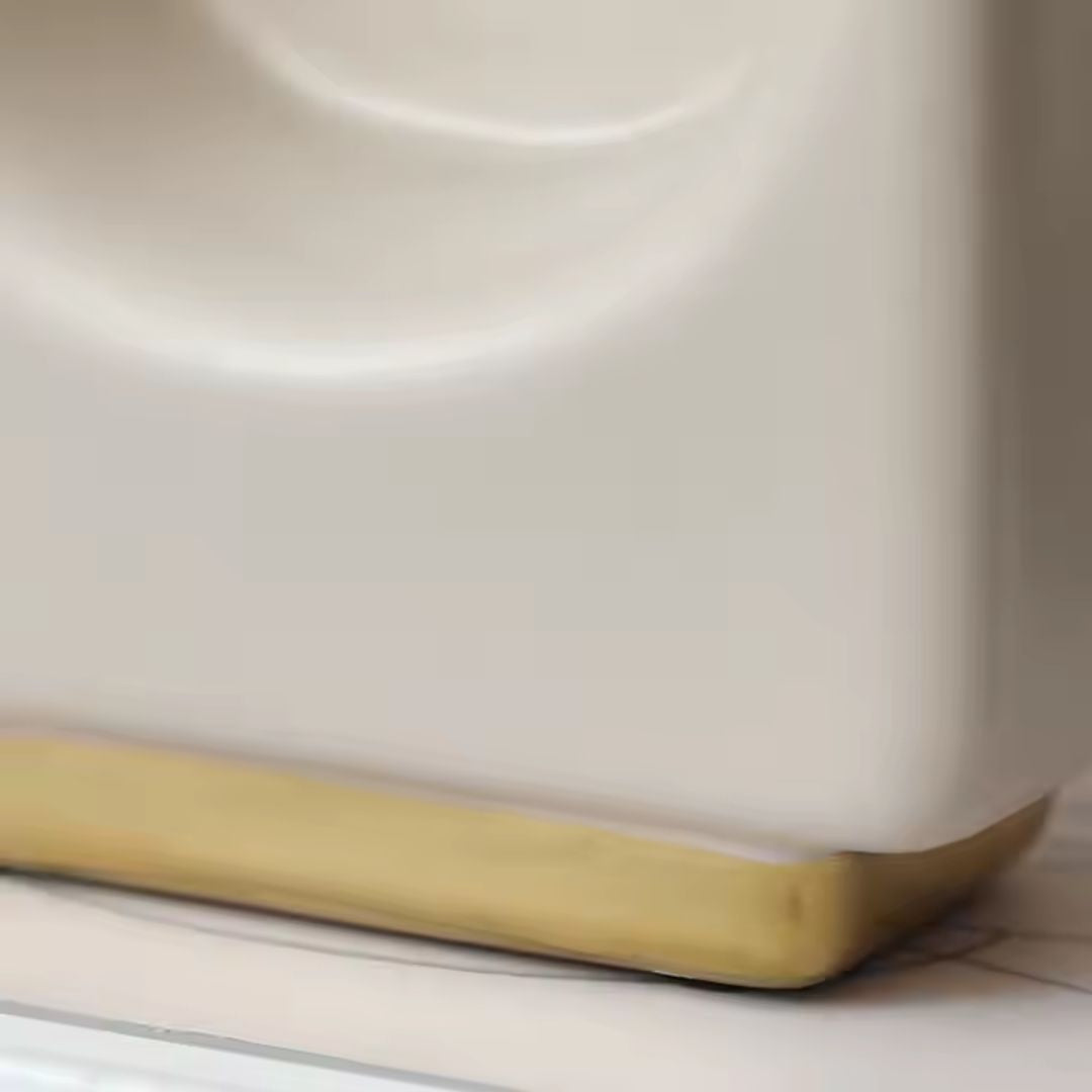 Gold ceramic table clock with a round face and gold base, stylish desk clock from BEACON FD-D25010 collection.