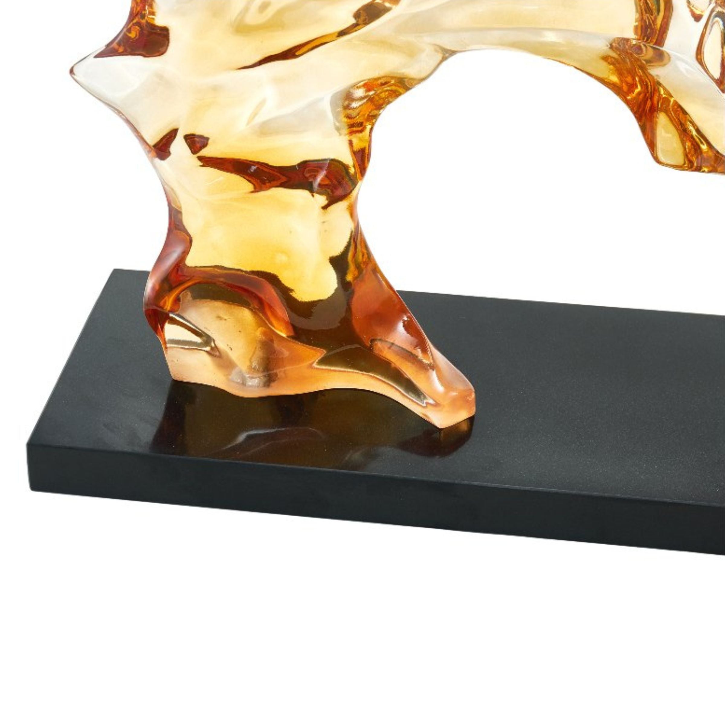 Golden abstract sculpture by BEACON home decor figurine, modern decorative art piece with sleek design and artistic detail.