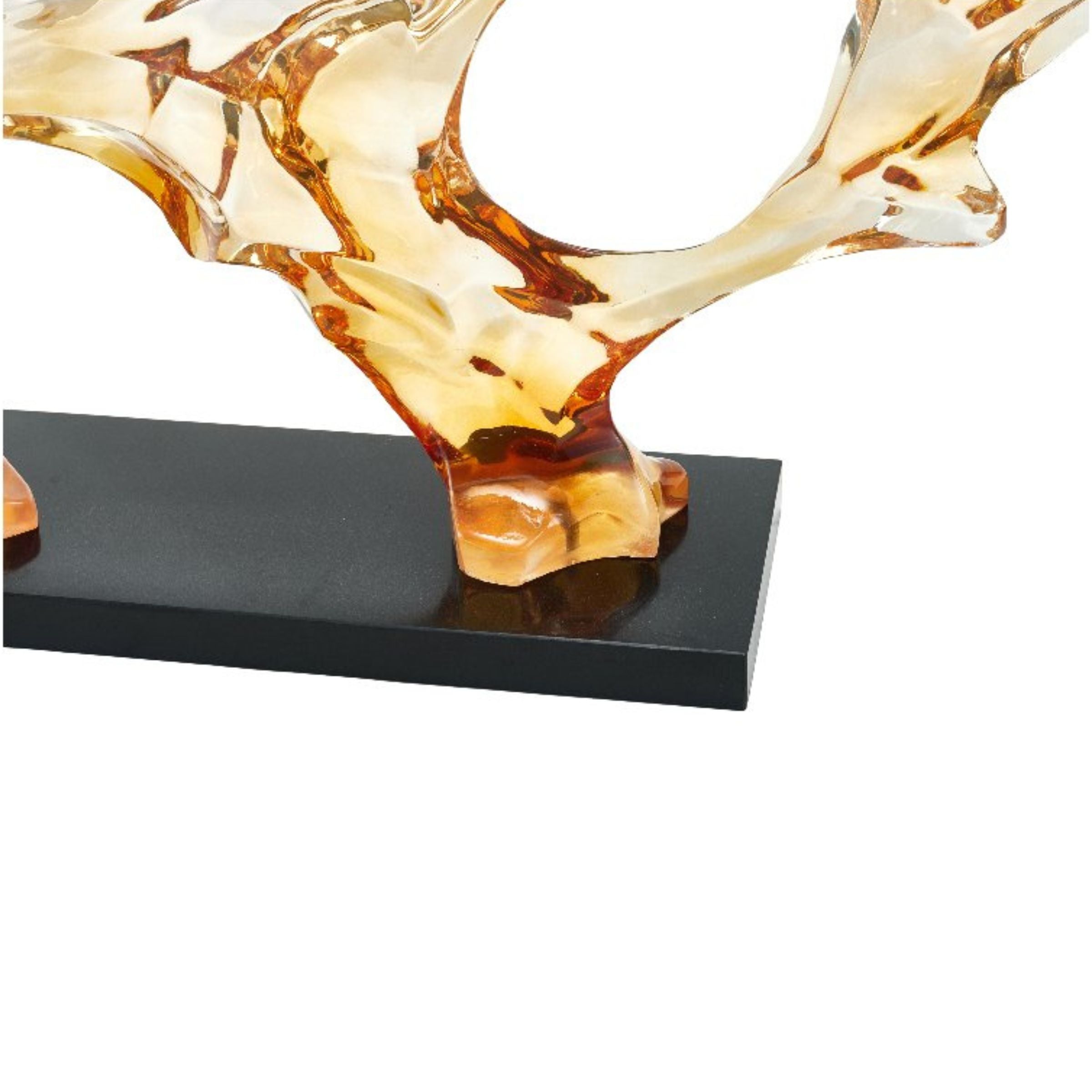 Golden abstract sculpture by BEACON, modern home decor figurine with artistic, flowing design for stylish interior decoration.