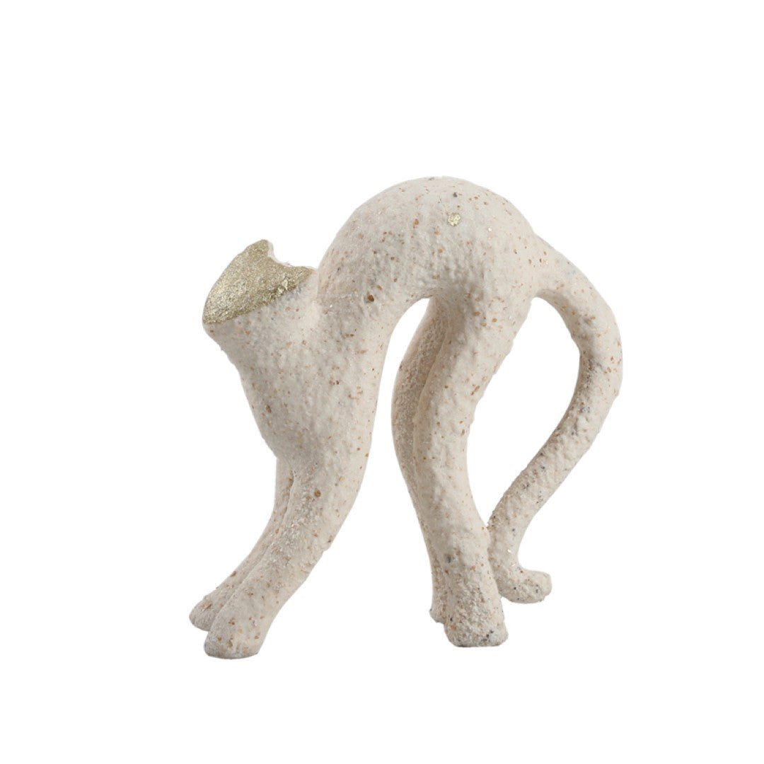 Golden face figurine from BEACON home decor collection, detailed golden sculpture for stylish interior decoration.