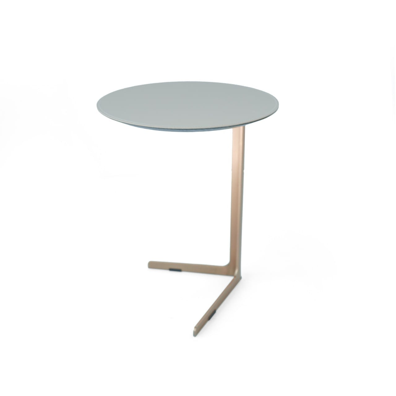 Golden Legs Saddle Leather Side Table by BEACON with sleek leather surface and sturdy golden legs.