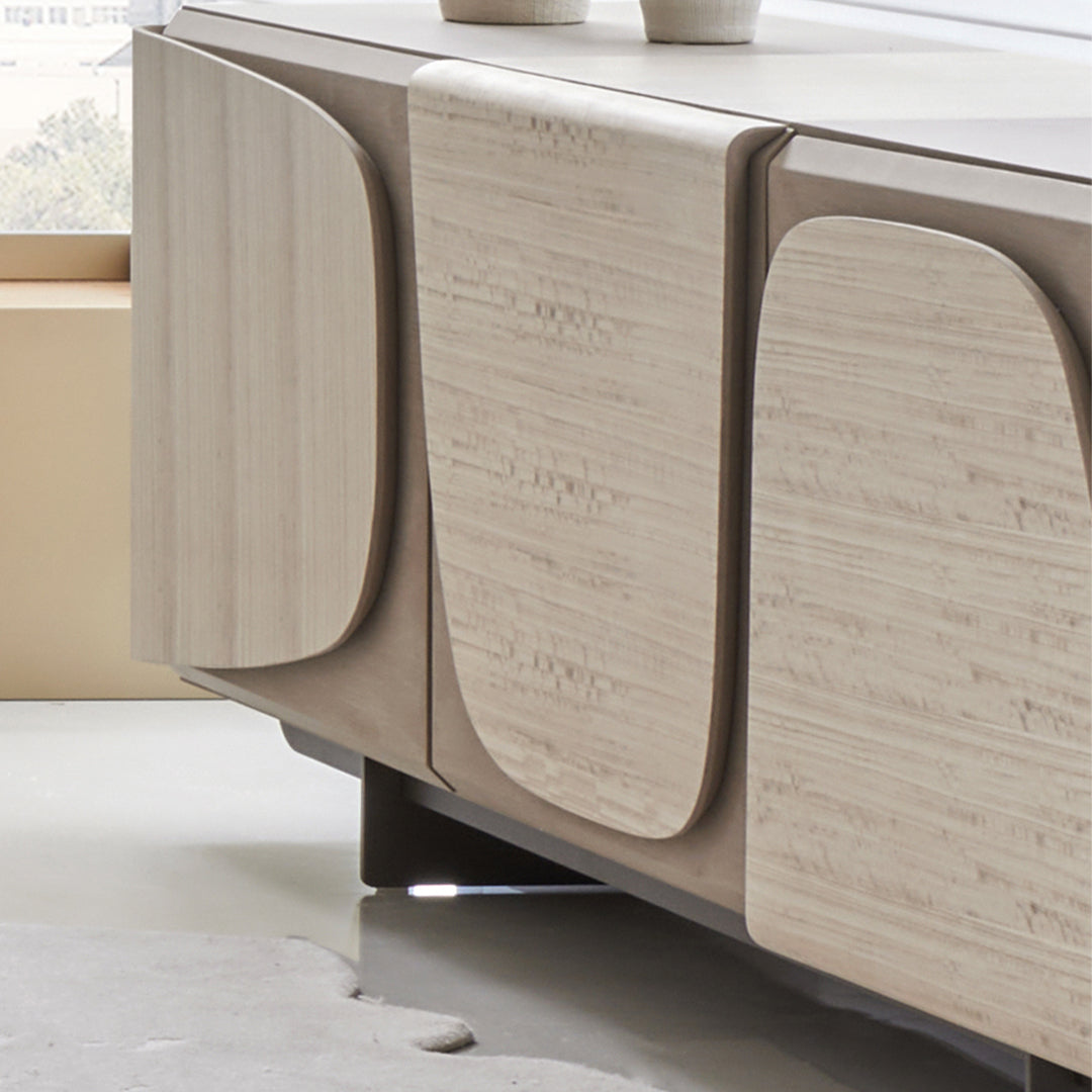 Beige veneer console cabinet with sleek design, featuring storage drawers and doors, suitable as a sideboard or buffet.