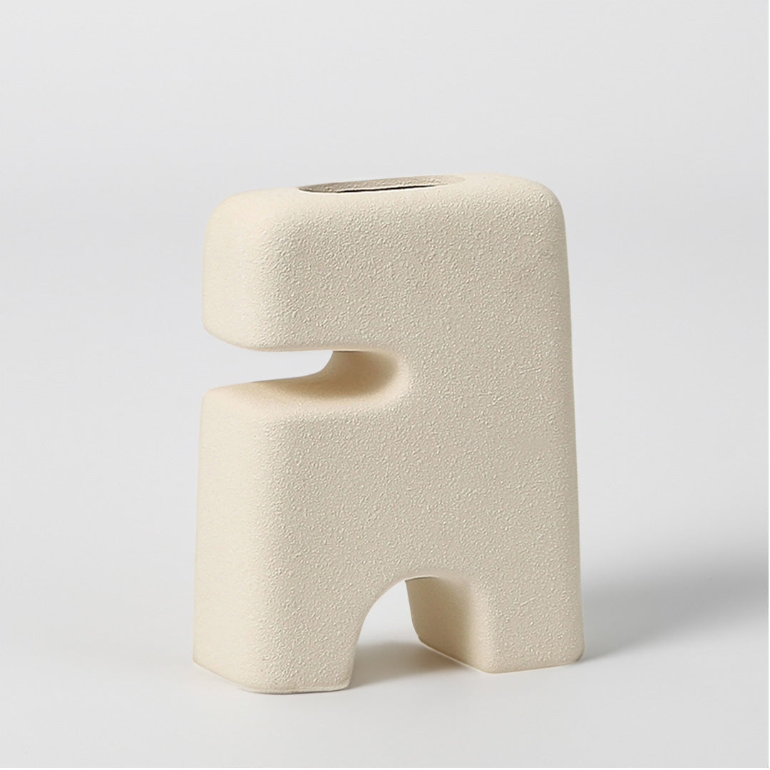 Half-cut bipedal bottle figurine from BEACON, a unique home decor decor piece showcasing modern artistic design.