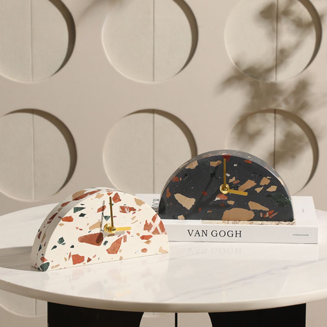 Half-round stone table clock with light color finish by BEACON, featuring a modern clock design on a sturdy stone surface.
