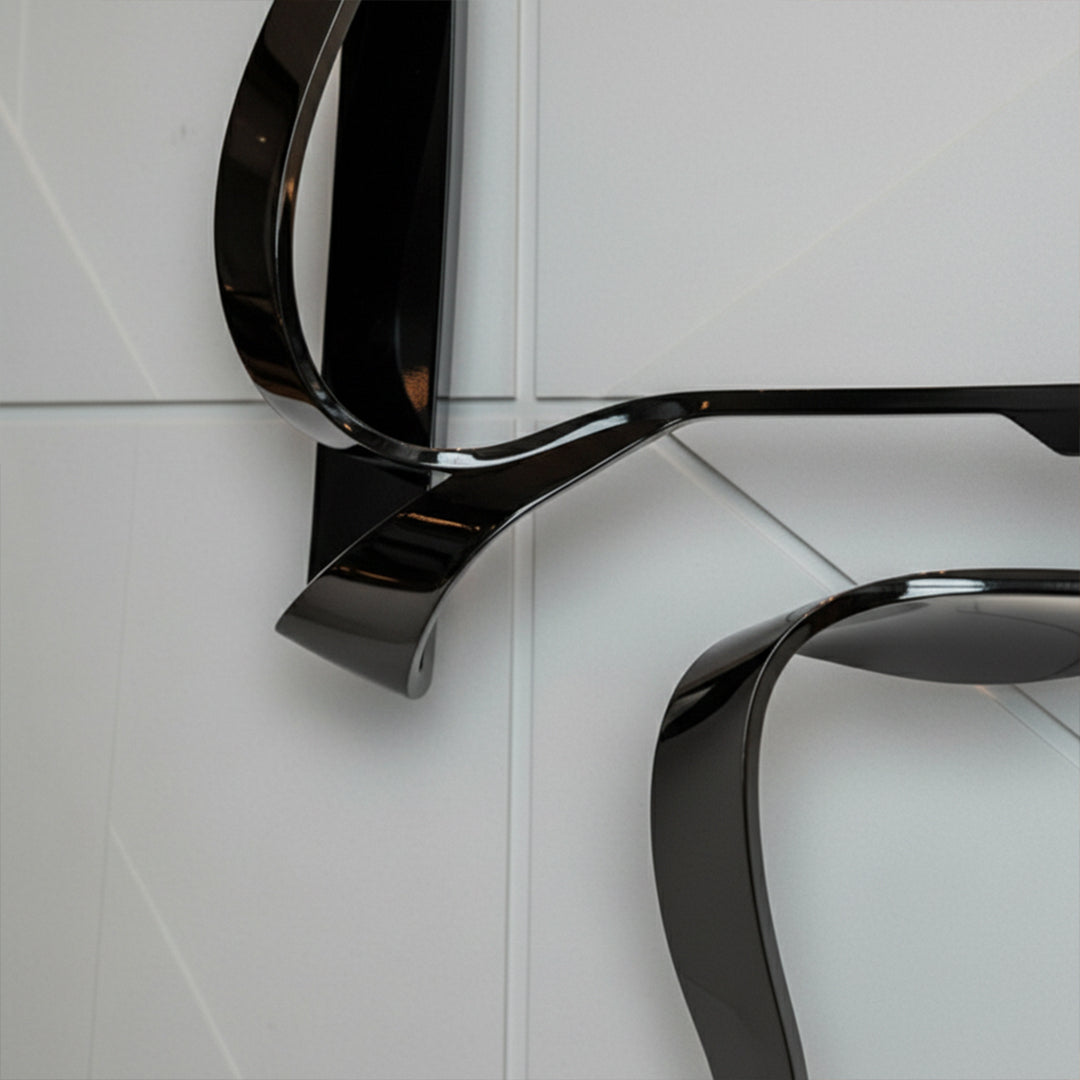 Handcrafted black stainless steel artwork shelf by BEACON, featuring sleek, modern design and artistic craftsmanship.