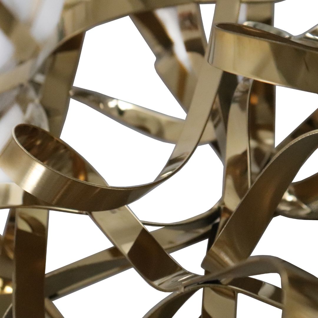 Hand-crafted titanium stainless steel artwork by BEACON, featuring intricate design and polished metal surface.