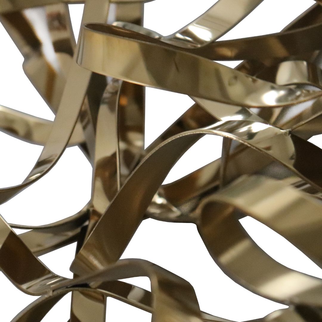 Handcrafted titanium and stainless steel artwork by BEACON featuring intricate metal design and artistic craftsmanship.