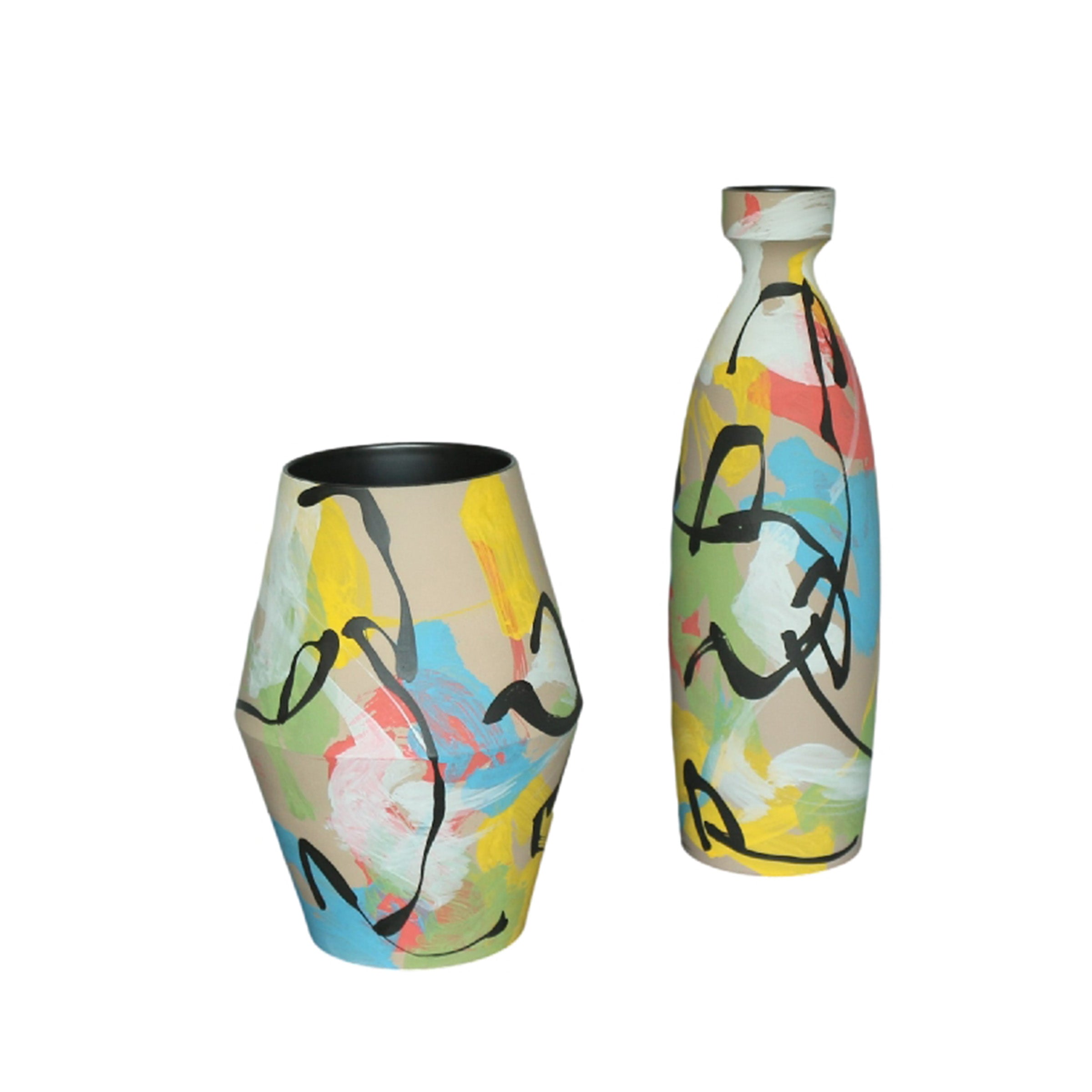 Hand-painted floral burst vase by BEACON featuring vibrant floral designs on a ceramic vase.