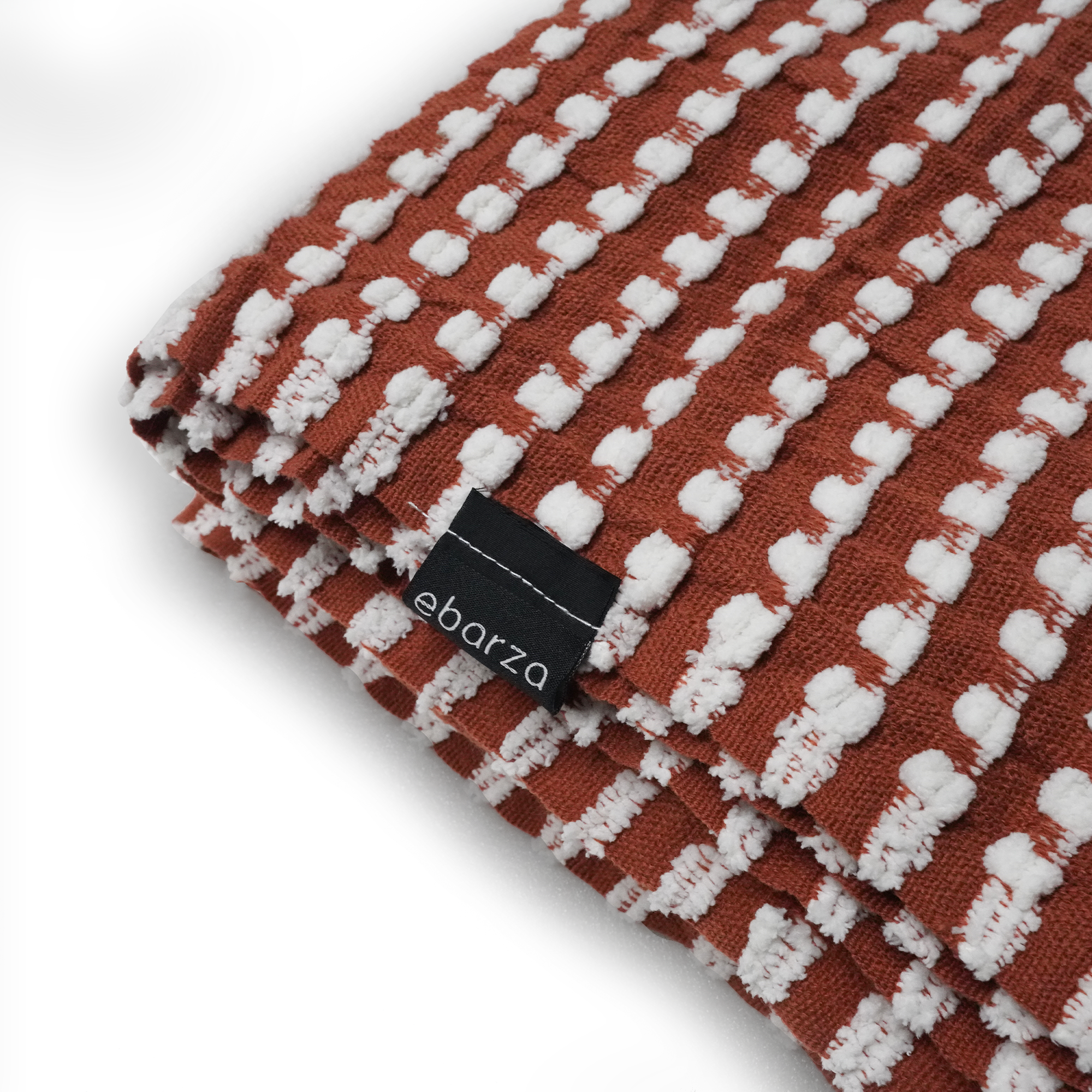 Handmade red throw blanket from BEACON, soft and cozy with intricate woven details, perfect for adding warmth and style.