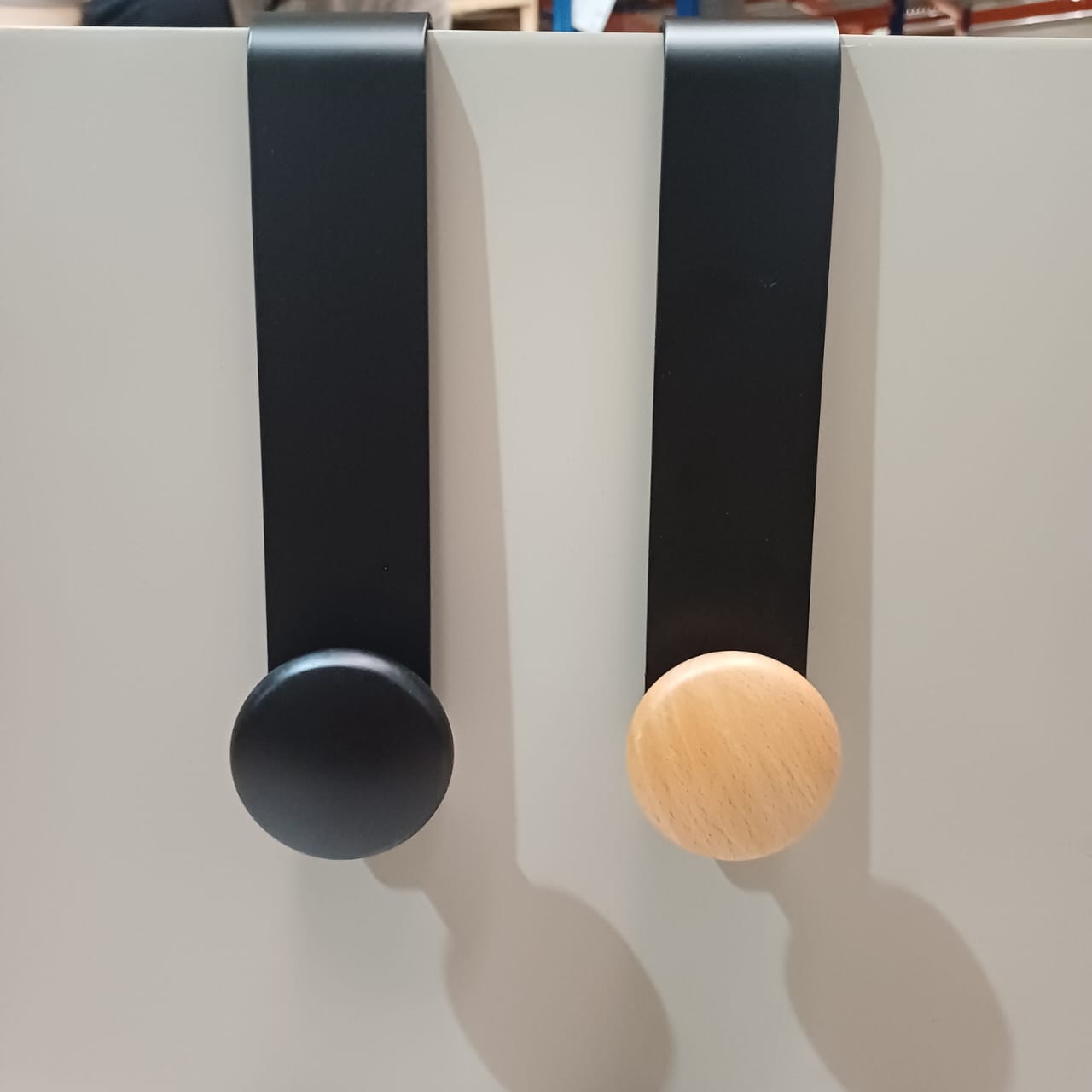 Black beech wood hanger with cap, 205x45mm, from BEACON, designed for clothing organization and storage.