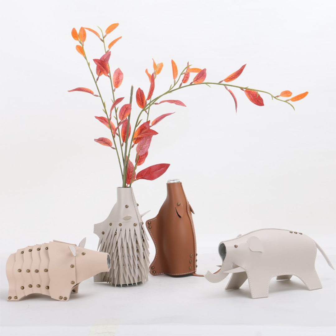 Ceramic hedgehog vase sculpture by BEACON, detailed beige hedgehog-shaped decorative vase for home decor.