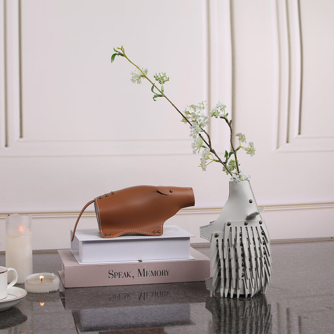BEACON hedgehog vase sculpture with detailed hedgehog design, perfect as a decorative ceramic vase or sculpture.