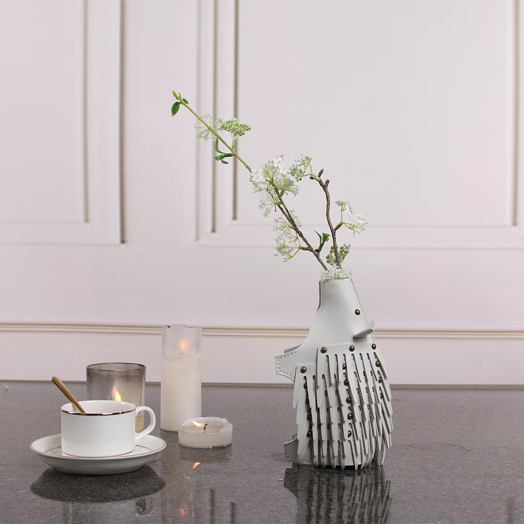 Beige ceramic hedgehog vase sculpture with detailed features, designed for decorative display and floral arrangements.