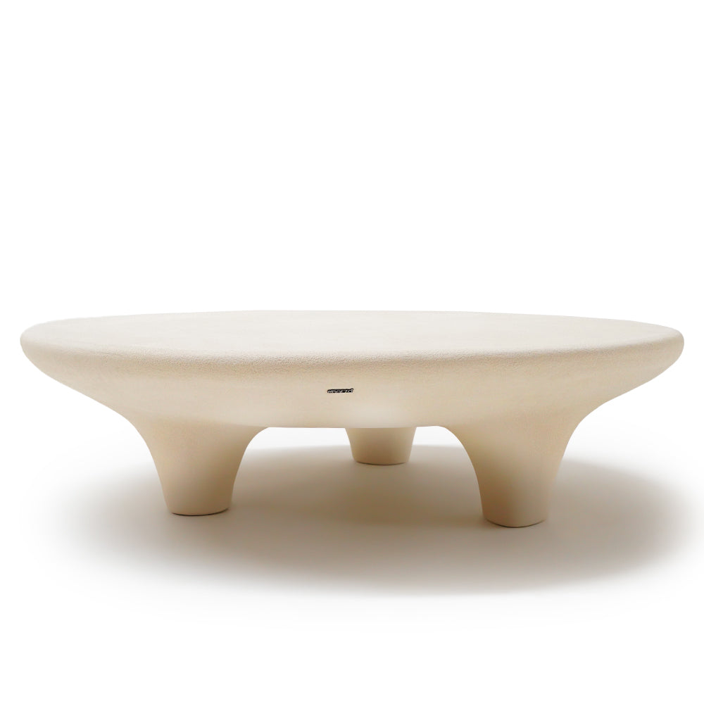 Indoor/outdoor beige coffee table with integrated planter boxes by BEACON, ideal for stylish indoor and outdoor spaces.