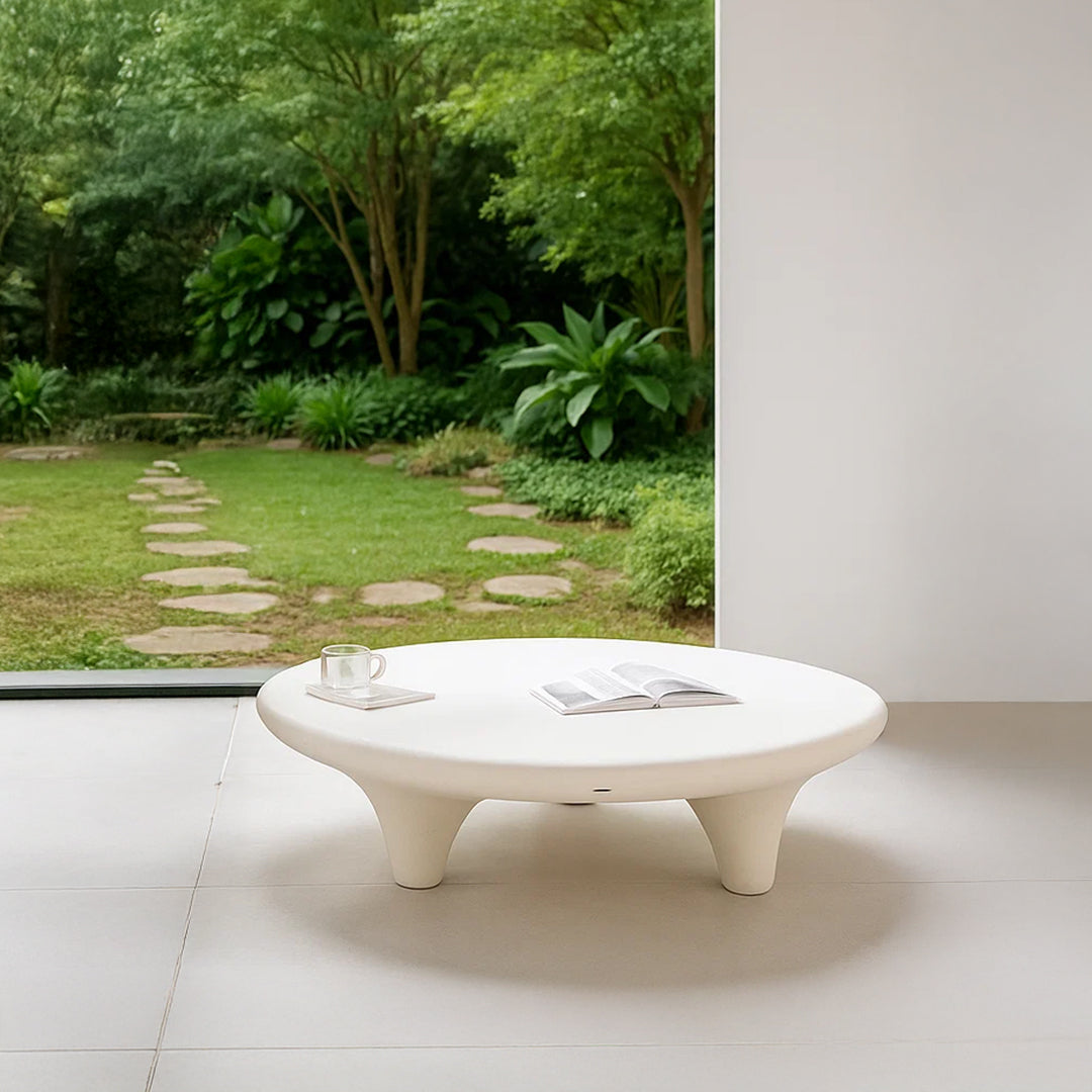 Indoor and outdoor beige coffee table by BEACON with built-in planter boxes, modern design for versatile living spaces.
