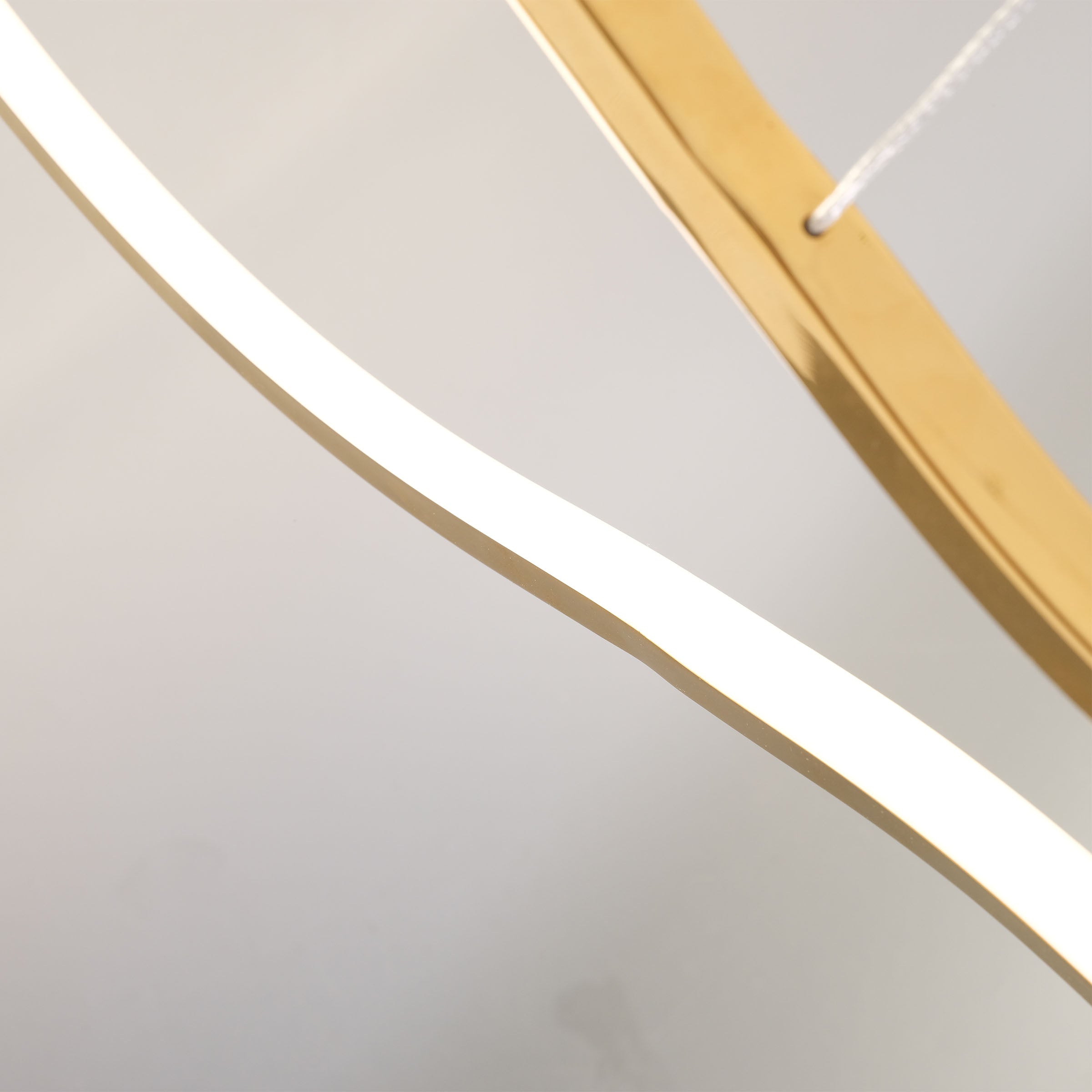Infinity Orbit stainless steel pendant lamp by BEACON, modern pendant lighting with sleek, circular design for contemporary interiors.