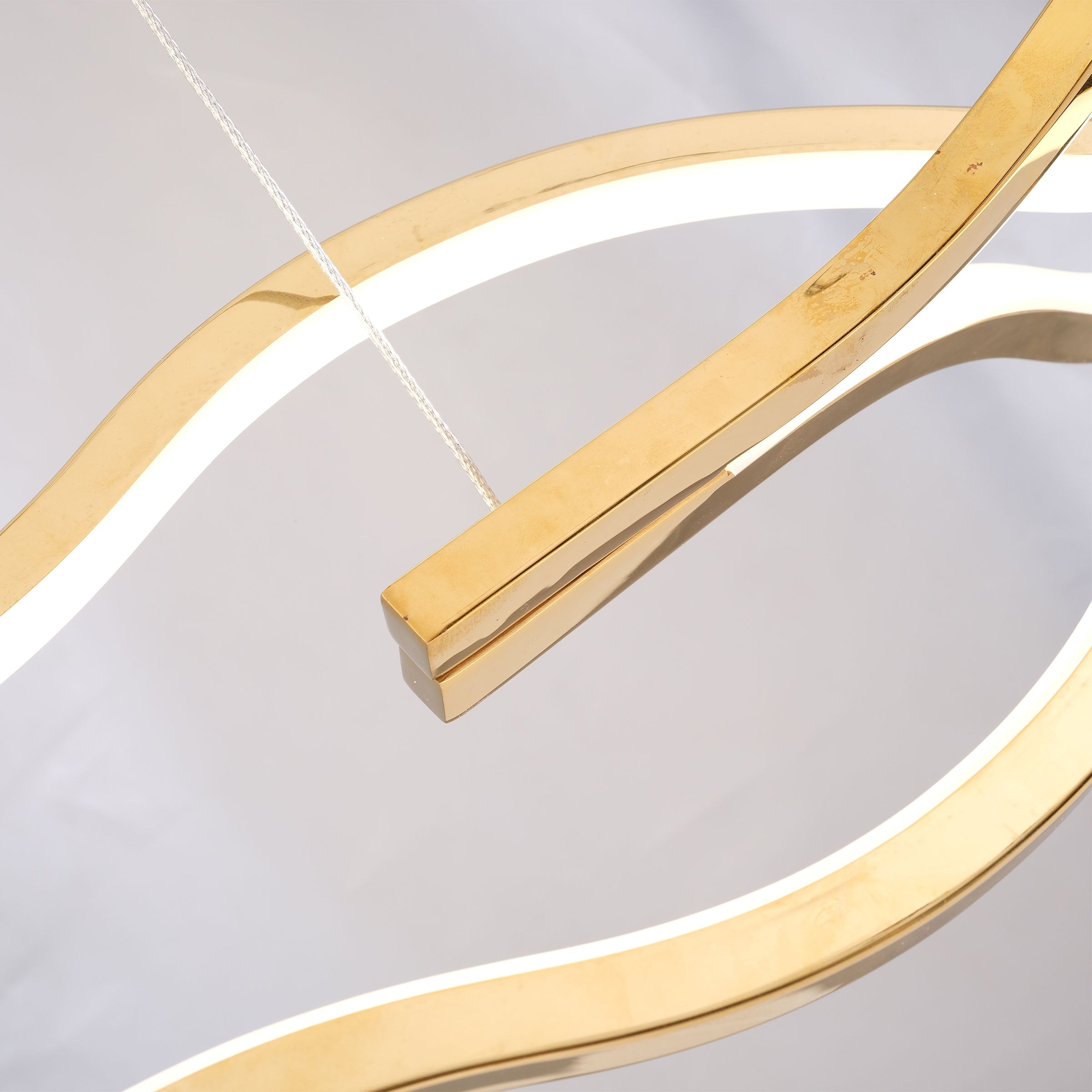 Infinity Orbit stainless steel pendant lamp by BEACON, modern fixture with sleek, orbit-inspired design for stylish lighting.