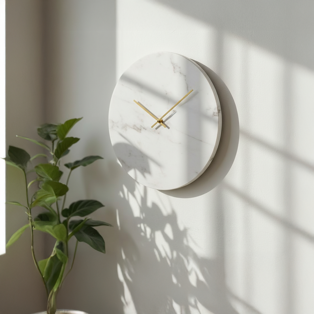 Jazz White Marble 10-inch wall clock by BEACON featuring a sleek marble design and minimalist clock face.