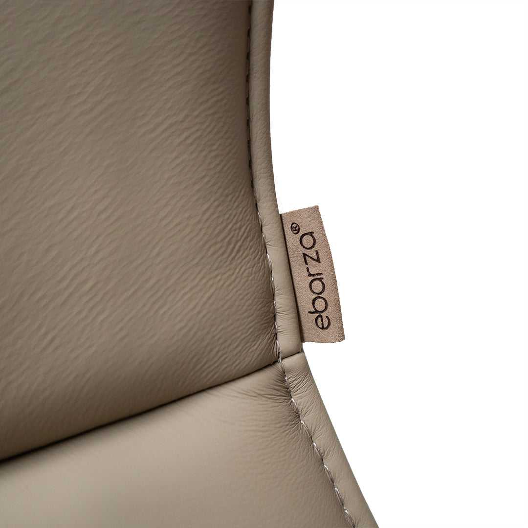 Beige JIATAI swivel lounge chair by BEACON with a modern design, featuring a rounded seat and swivel base.