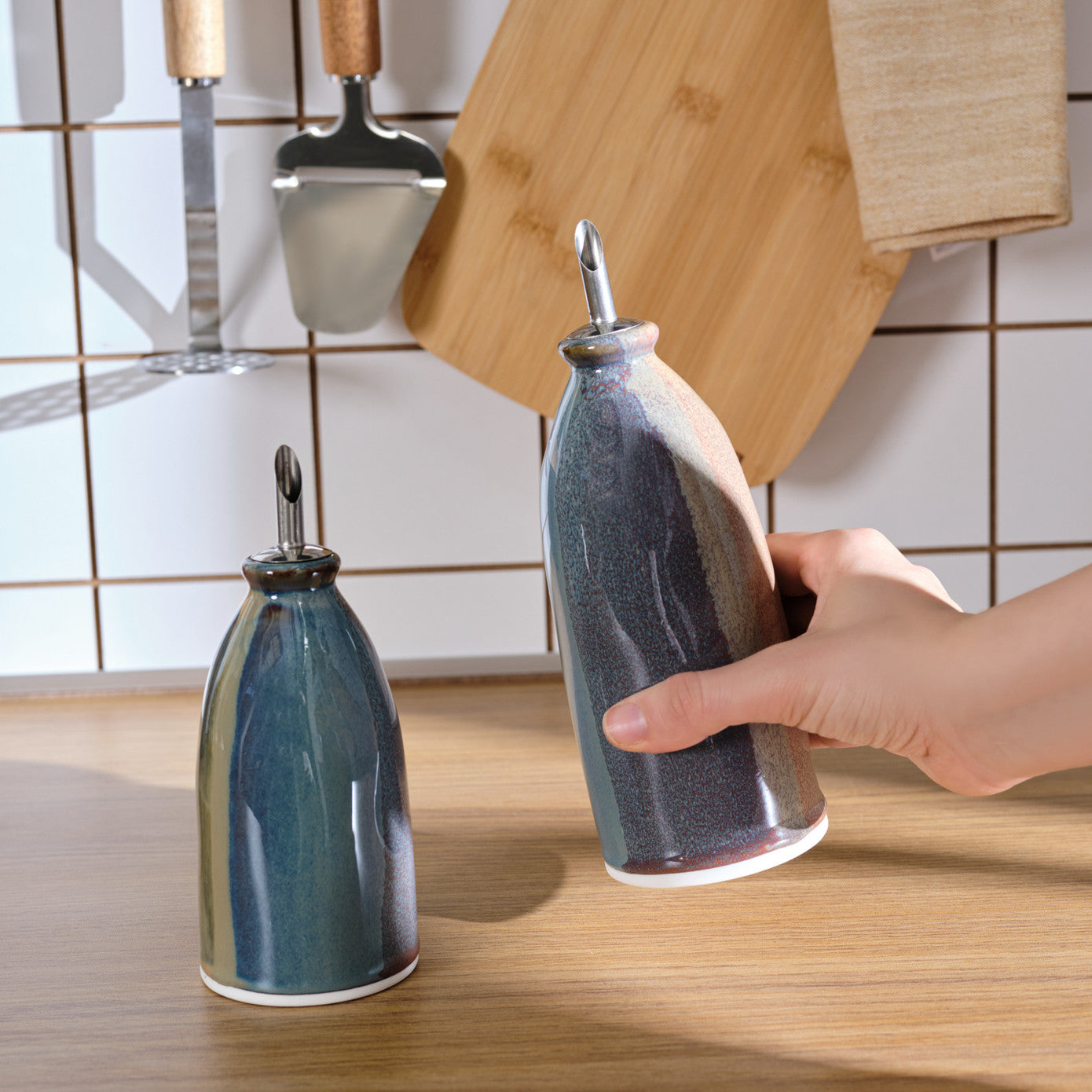 Karaca Dory 2-piece oil bowl set from the spice sets collection, featuring ceramic containers with lids for oil storage.