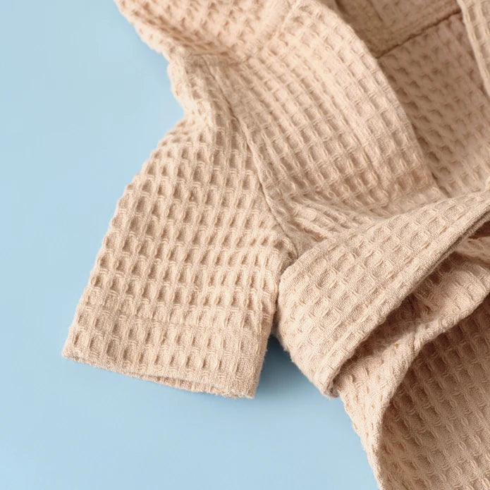 Beige Karaca Home X Paw Oliver pet bathrobe set with hood and belt, made for comfortable, stylish pet grooming and after-bath warmth.