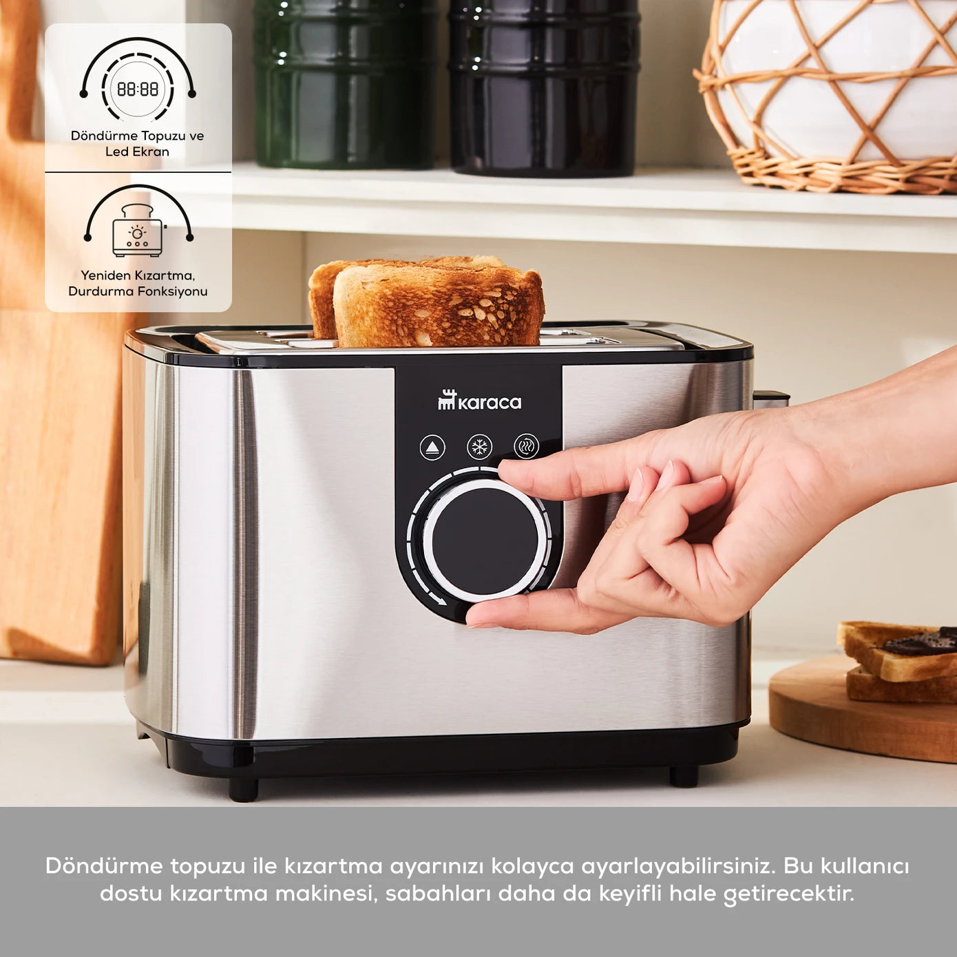 Karaca Inox Toaster 2303 kitchen appliance with stainless steel exterior, four bread slots, and control buttons on top.