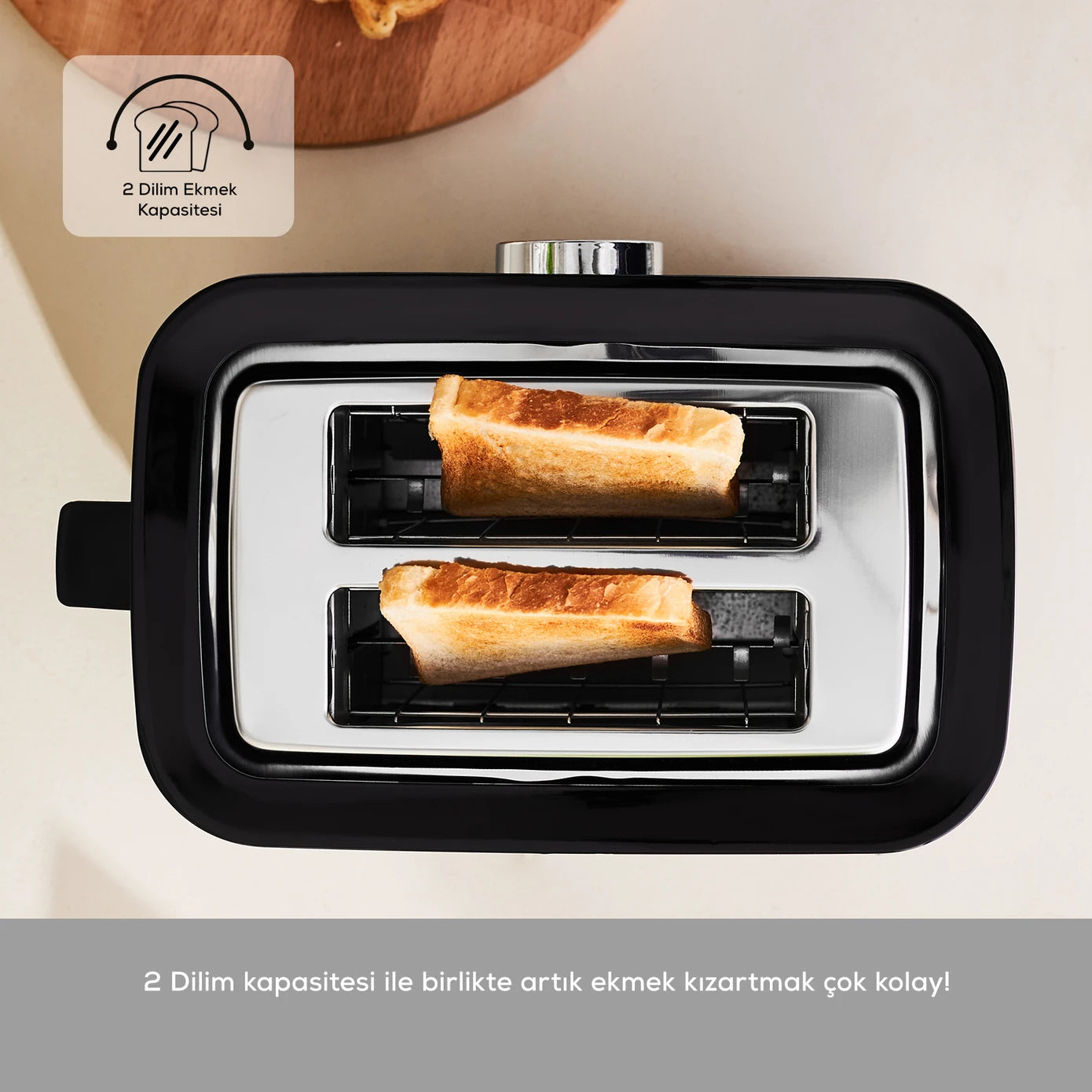 Karaca Inox Toaster 2303 with stainless steel finish, four bread slots, and control dials for toasting bread and bagels.