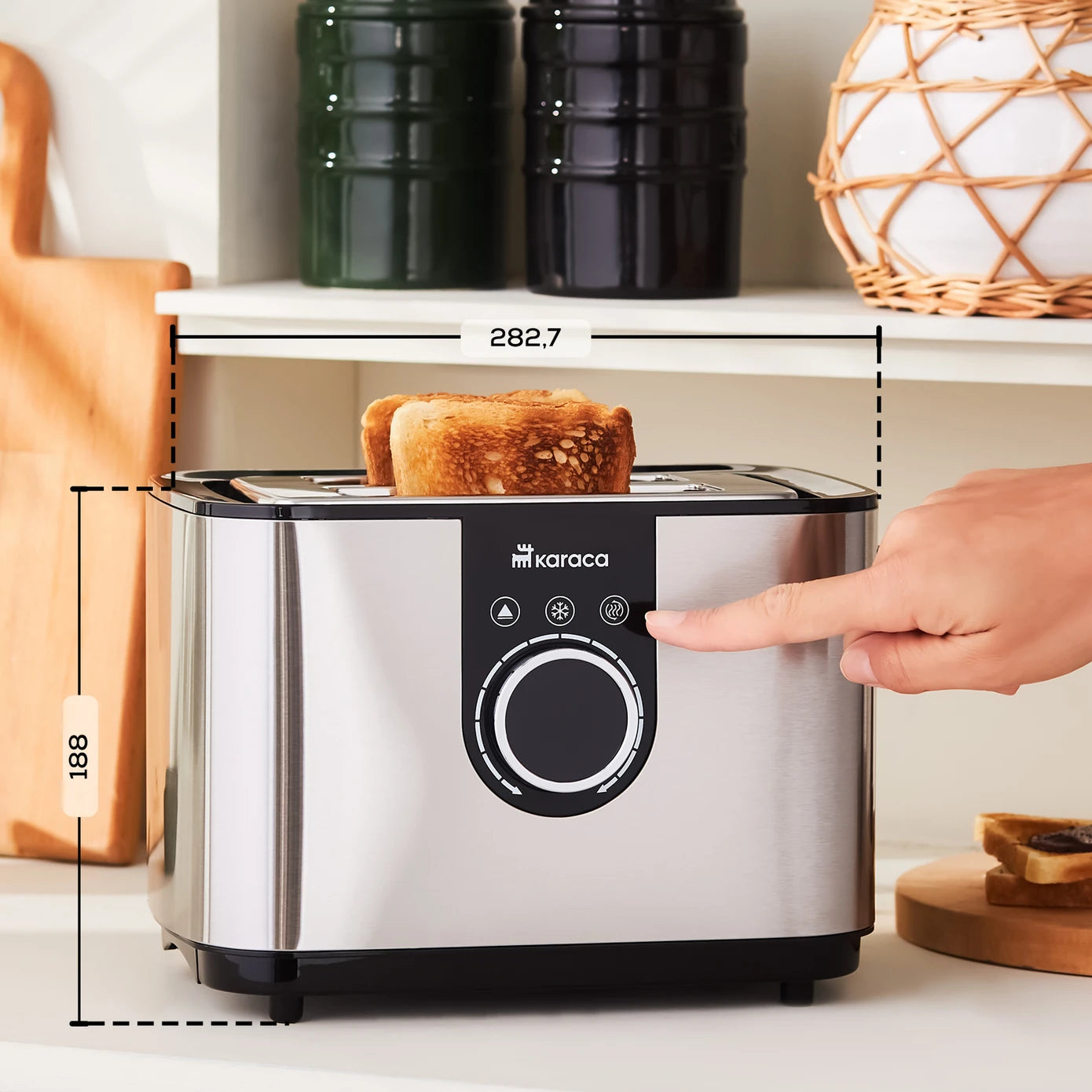 Karaca Inox Toaster 2303 kitchen appliance with stainless steel finish, two slots, and control buttons on top.