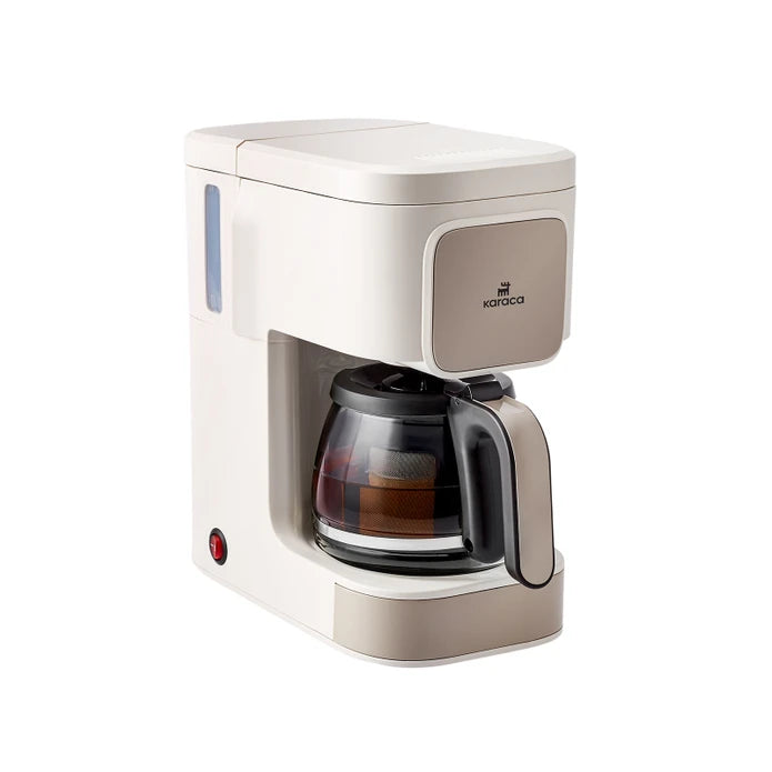 Karaca Just Coffee Aroma 2-in-1 filter coffee and tea brewing machine in a modern kitchen setting.