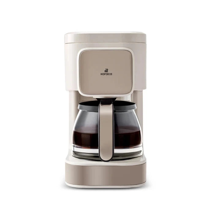 Karaca Just Coffee Aroma 2-in-1 filter coffee and tea brewing machine on kitchen counter, black and silver design.