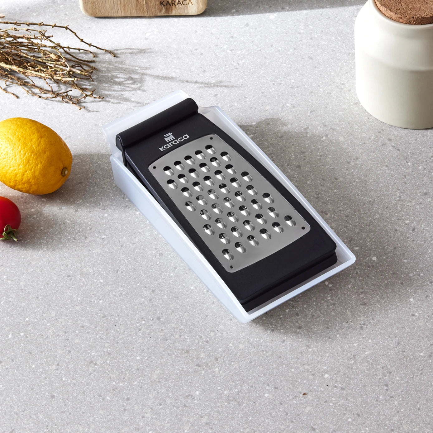 Karaca Nancy double-sided foldable grater for cookware, featuring dual sides for versatile grating, in a compact design.