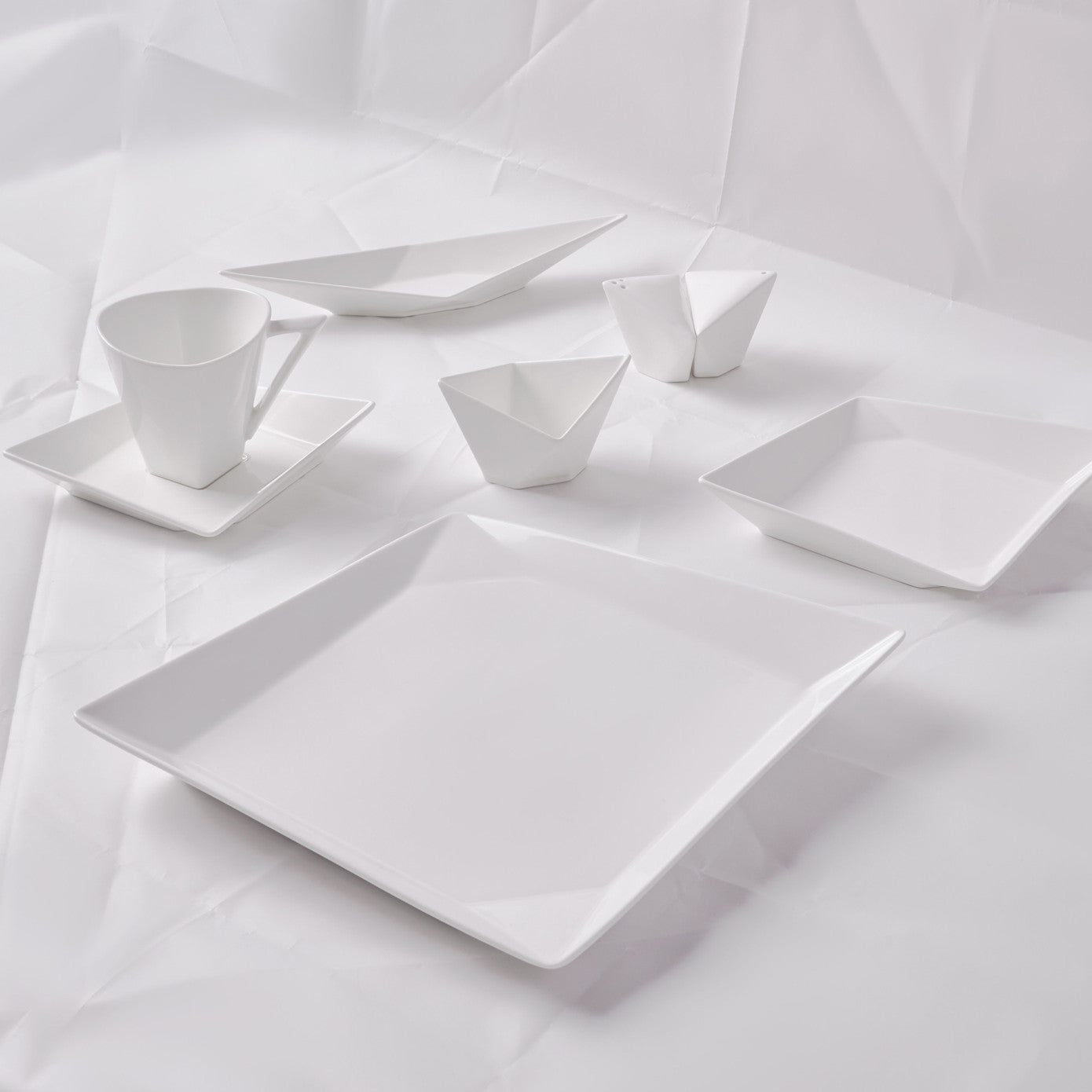 Karaca Origami New Bone 26-piece dinnerware set with plates, bowls, and mugs for 6 people, elegant breakfast and serving dinnerware.
