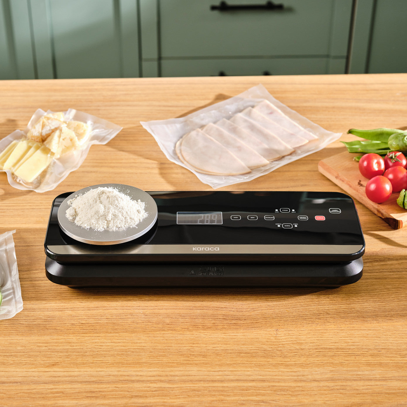 Karaca Seal and Fresh Inox weighed vacuum machine for kitchen appliances, with digital controls and stainless steel finish.