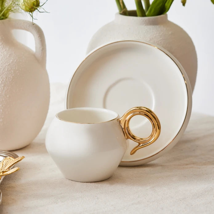 Karaca Venus Gold set of 2 coffee cups, 135 ml, with elegant gold accents, made for stylish coffee serving.