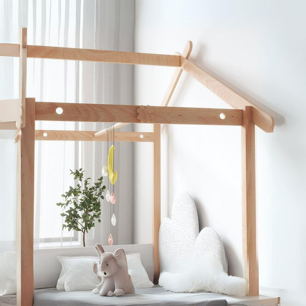 Kids bed with fabric tent and foldable mattress by BEACON, featuring a cozy play area and sturdy frame for children.