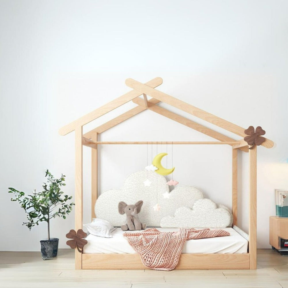 Kids bed with fabric tent and foldable mattress by BEACON, featuring a cozy, playful design for children's bedroom.