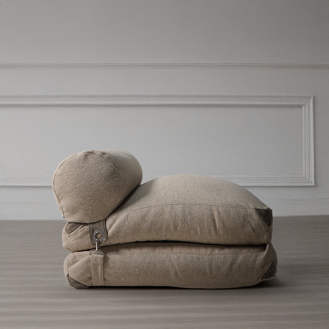 Brown and beige La-Concha Sunproof 100% Olefin bean bag by BEACON, showcasing a soft, cushioned outdoor seating option.