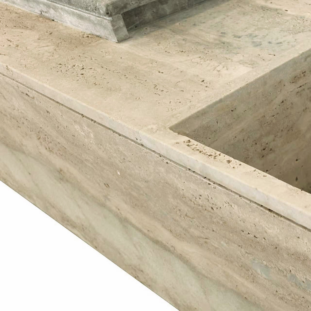 Lapis travertine bench and side table with built-in planter box by A2STONE, featuring a smooth, modern design and natural stone finish.