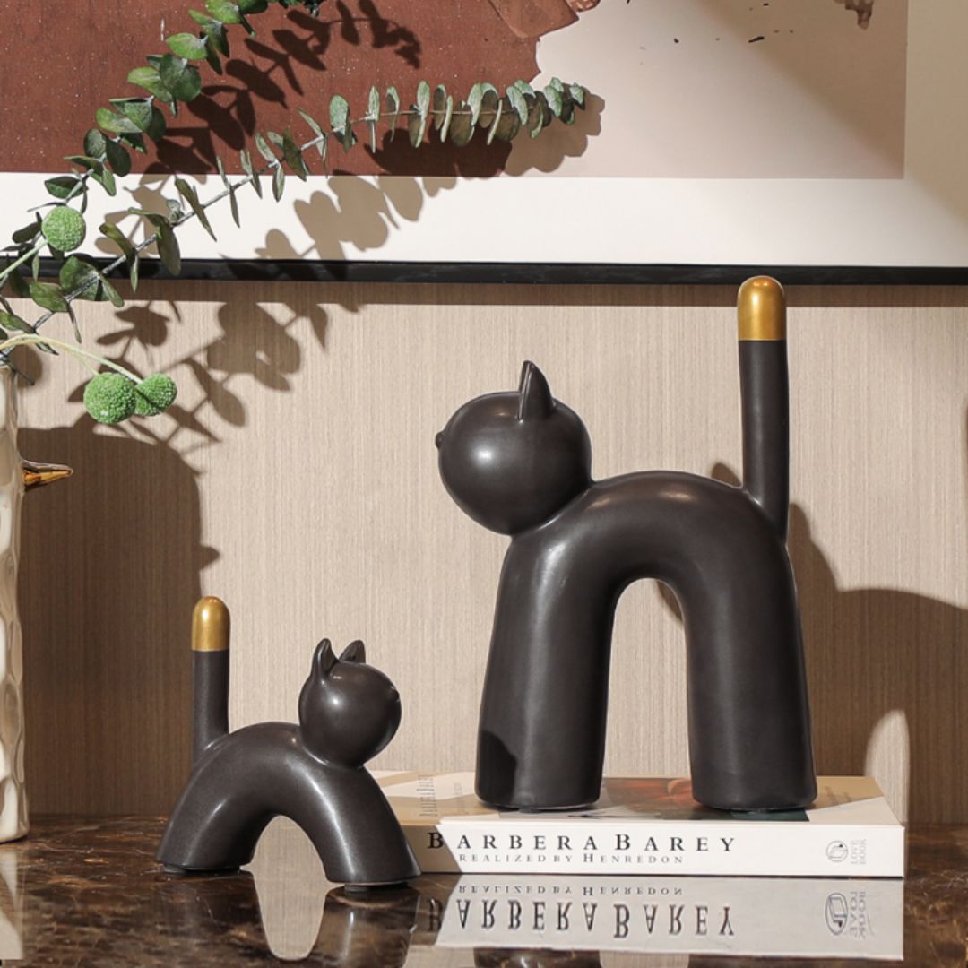 Lazy cat figurine from BEACON home decor collection, featuring a relaxed cat sitting in a cute, detailed pose.