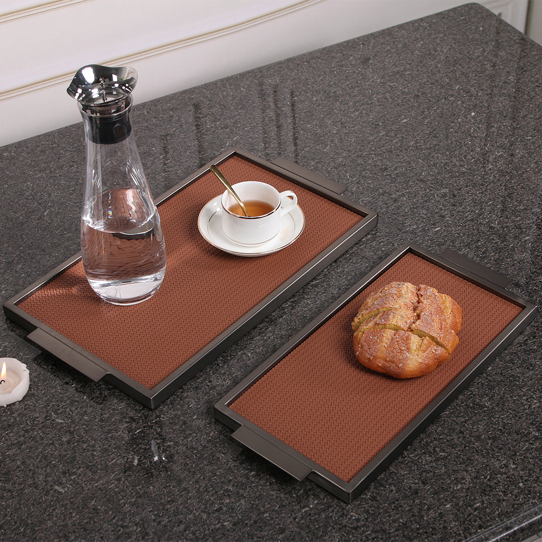 Brown leather and metal tray with handles, rectangular design, handcrafted by Beacon, ideal for serving or decorative use.