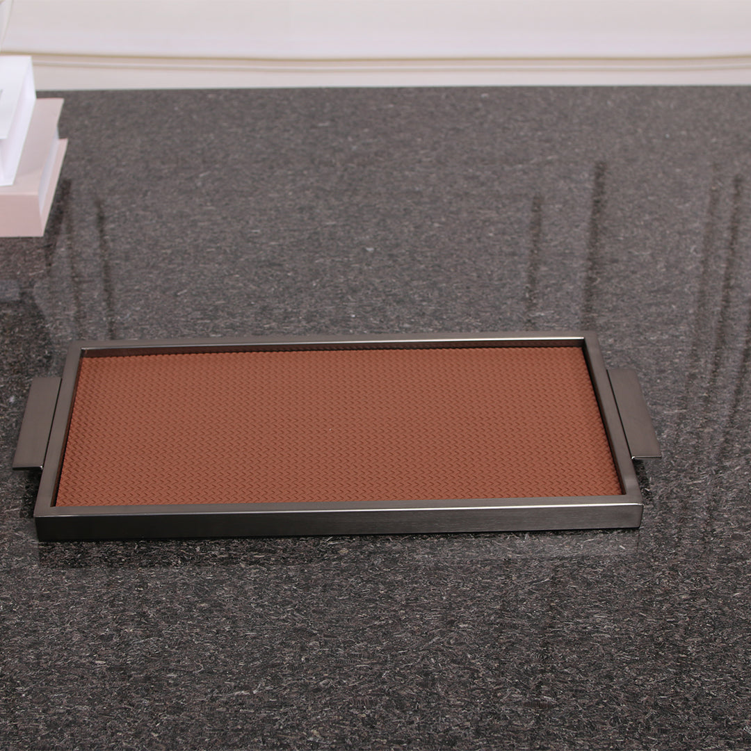 Brown leather and metal tray by Beacon, rectangular tray with sleek design for serving or decorative use.