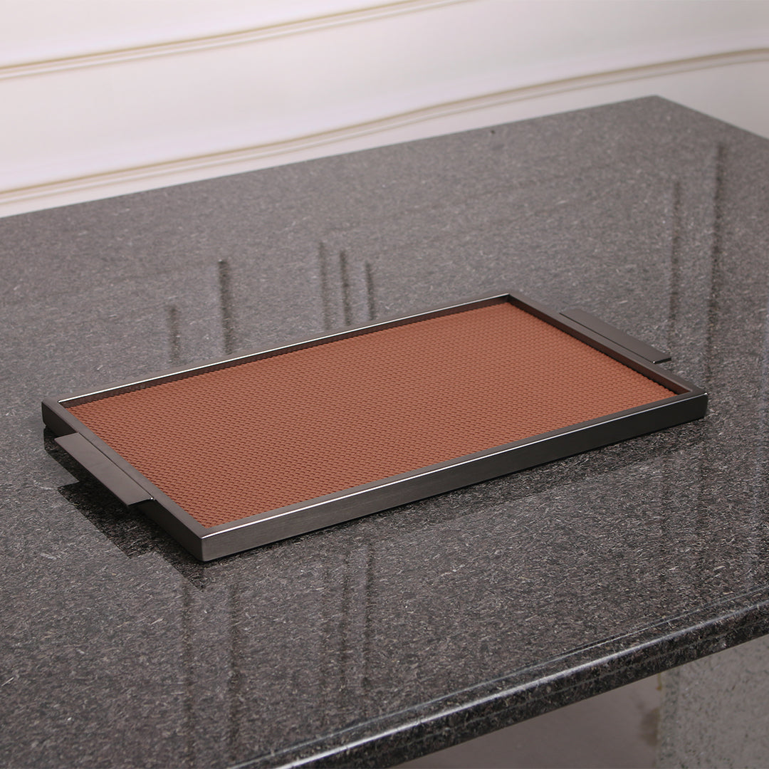 Brown leather and metal tray by Beacon, rectangular design with sturdy handles, perfect for serving or decorative use.