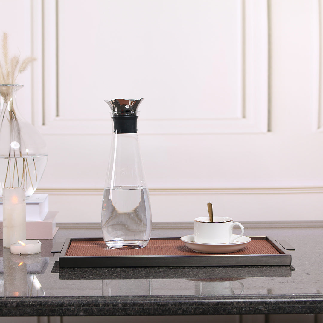 Brown leather and metal tray by Beacon with a rectangular shape, perfect for serving or decorative use.