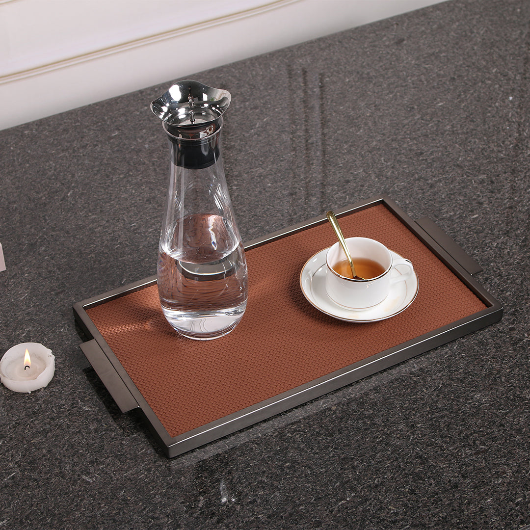 Brown leather and metal tray from Beacon with a sleek rectangular design, perfect for stylish organization.