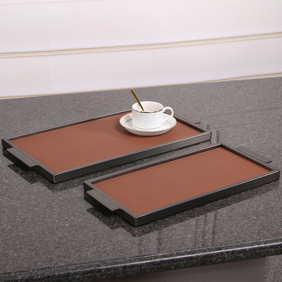 Brown leather and metal tray by Beacon, rectangular design with sleek edges, ideal for serving or decorative use.