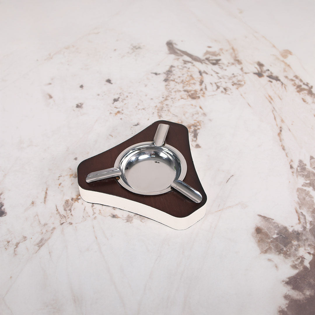 Leather triangle ashtray by BEACON, made of leather with a modern geometric design, used as a stylish home decor figurine.