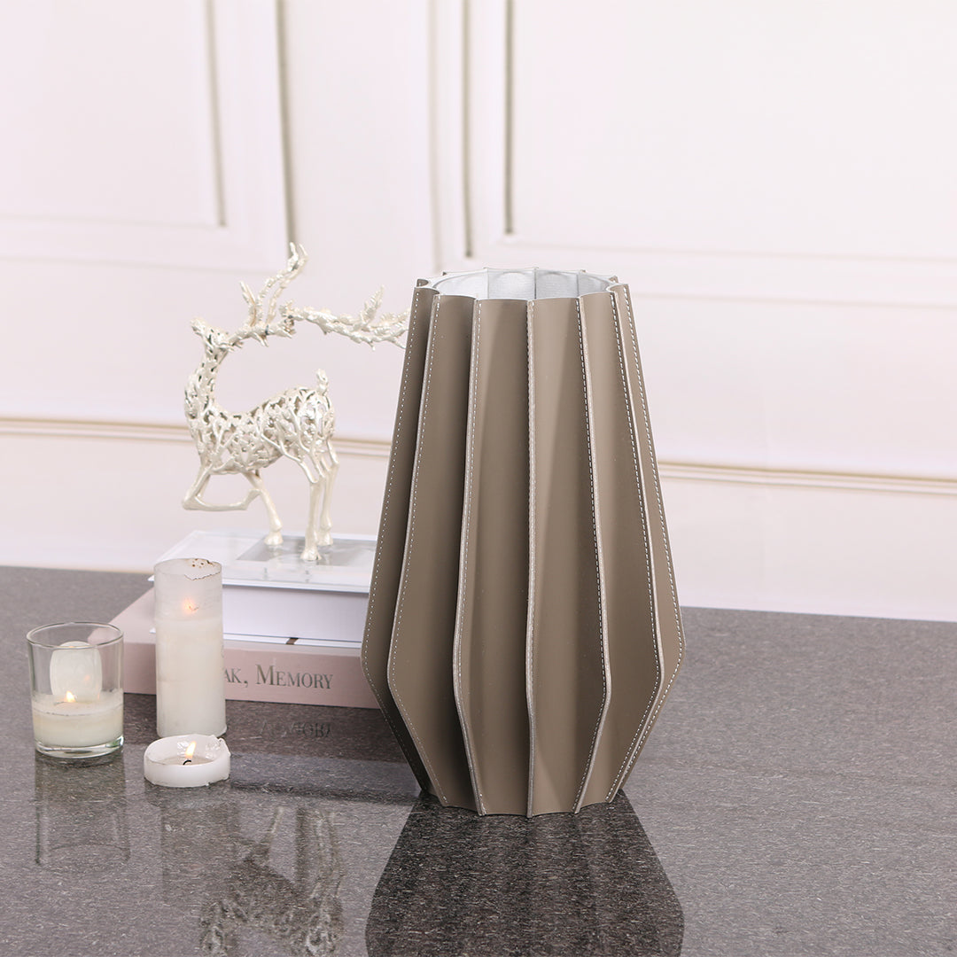 Leather vase from BEACON, dry and fresh style, with a sleek, textured leather exterior for decorative use.