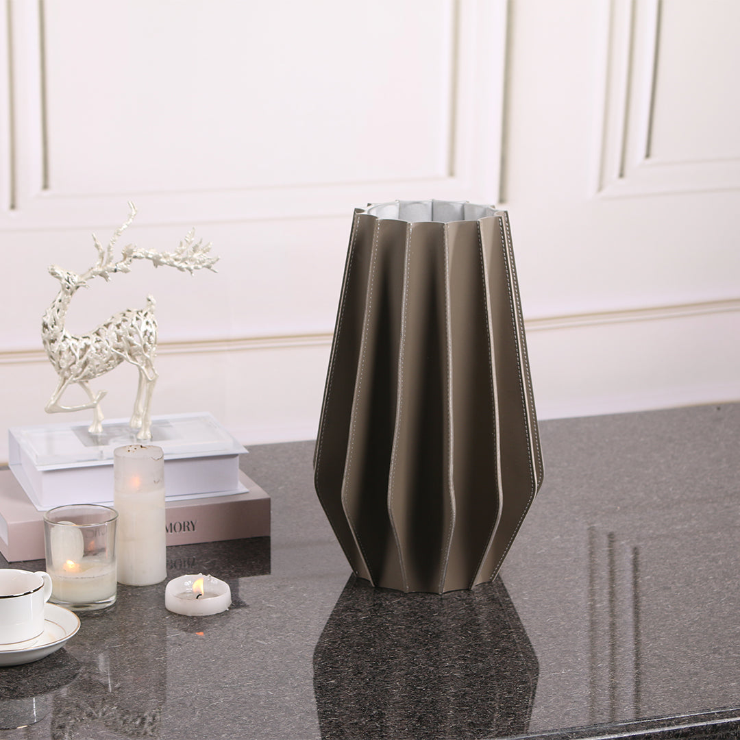 Leather vase from BEACON with a sleek, textured design, suitable for dry or fresh floral arrangements.
