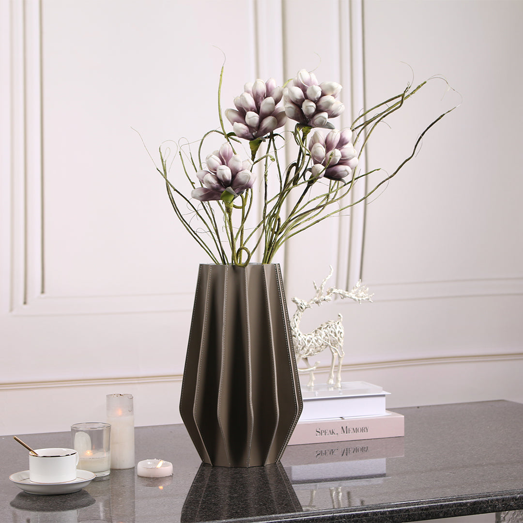 Leather vase by BEACON with a sleek, textured design suitable for dry or fresh flowers, model KB3008DL.
